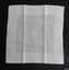 Square white fine cotton fabric, wide hem, embroidered Celtic Cross in front of two rings