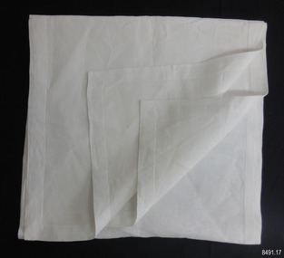 Rectangle of fine white linen with hand stitched hem