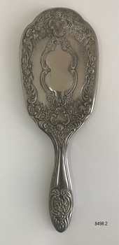 Back view of ornate hair brush