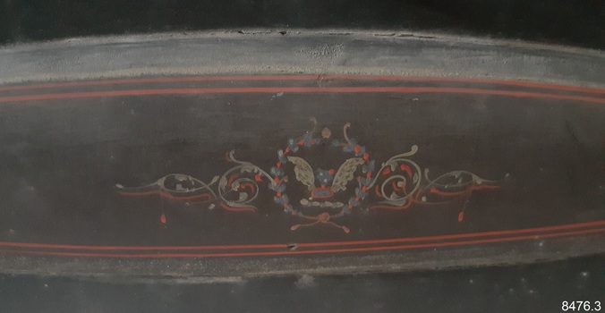 Details and line painted in blue, cream and red