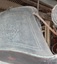 Swirling patterns pressed into leather on outside of backrest, right side
