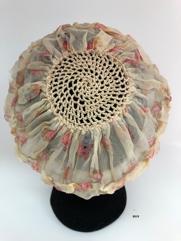 Back view of lady's floral silk boudoir cap