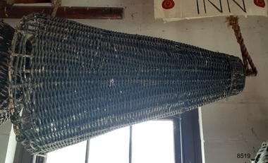 Black cane cone shaped signal with metal fittings
