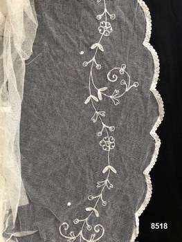 View of veil showing lace pattern and edging.