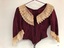 Front view of satin bodice that shows lacing.