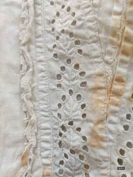 Broderie anglaise embroidery on front of bodice of child's dress