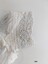 Sleeve with pintucks and broderie anglaise trim