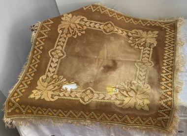 Front view of stitched fringed tablecloth
