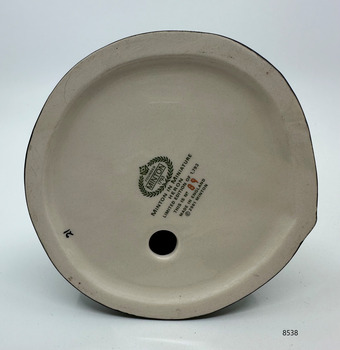 Bottom of the heron with makers marks and information 
