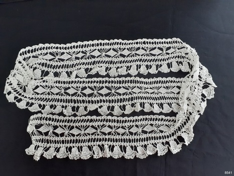 Complete view of length of handmade crochet lace.