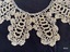 Close view of section of crochet lace to show pattern.