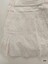 Bottom of petticoat showing two wide and three narrow pintucks and broderie anglaise lace trim