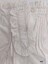 Top right of sampler showing frilled opening, pintucks, decorative embroidery and buttonhole
