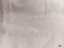White cross stitch on flannel showing initials L L and date 1897