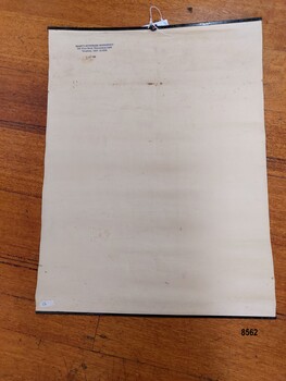 Back of poster with newsagency stamp in top left corner