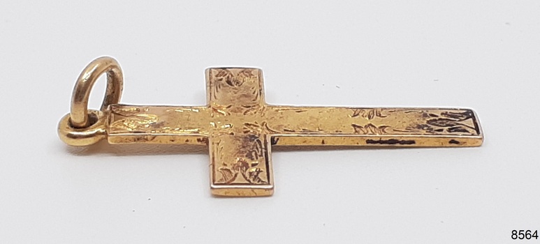 View shows two long marks on the edge, of the cross