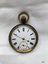 Front view of fob watch with roman numerals.