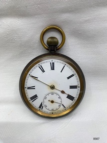 Front view of fob watch with roman numerals.