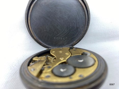 Inside view of fob watch showing the inscribed number on the middle cover of the watch.