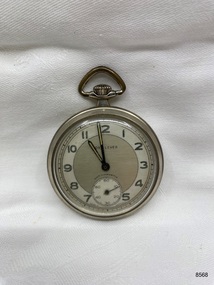 Front view of silver coloured fob watch.