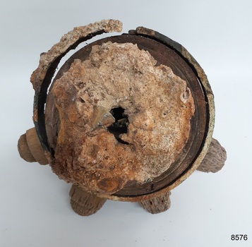 Back hub and metal reinforcing have encrustations on them
