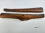 Pair of leather dray shaft protectors with stamped pattern running horizontally