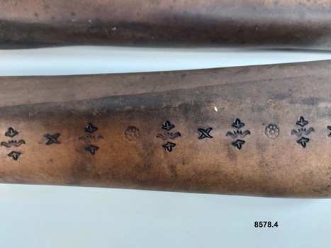 Stamped design along length of leather dray shaft protectors