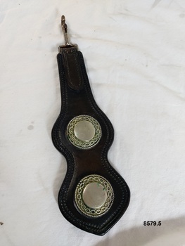 Leather Dropper with two metal rosette decorations and a metal clip at the top