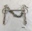 Back of stainless steel horse bit showing plain side of mouth bar