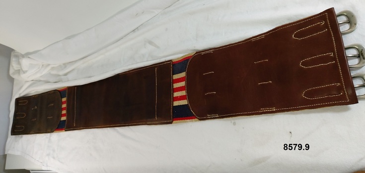 View of underside of leather and canvas belly band
