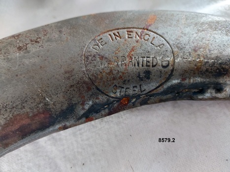 Oval stamp on side of hames which reads "Made in England Warranted Steel"