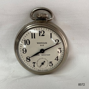 Front view of silver toned fob watch.