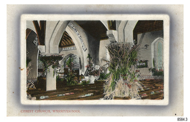 Rectangular card with oval cameo image of the inside of a church with arch pillars