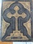 Brown leather back cover embossed with gilt detailing