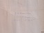 Close-up of inscription on front of plane, with title of plan
