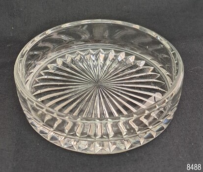 Clear glass round bowl with concertina fan cut glass pattern