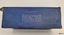 Side of blue box showing printed text on the box