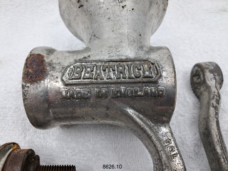 Manker's details are moulded into the metal of the mincer