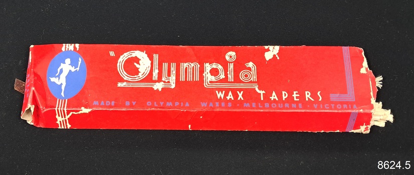 Red cardboard box with labels and text