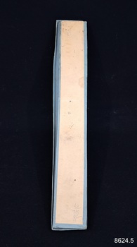 Close-up of wax tapers in the box