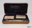 Safety razor and spare razor blades in case.