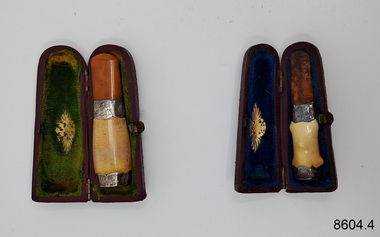 Rectangular cases with one rounded end, containing smokers' mouthpieces