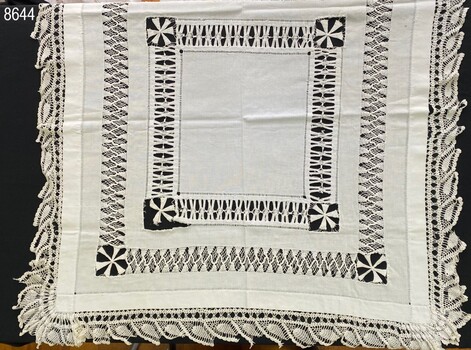 Flat view of tablecloth to show overall pattern.