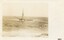 Postcard with sepia photo of a sailing ship foundering near a large rock