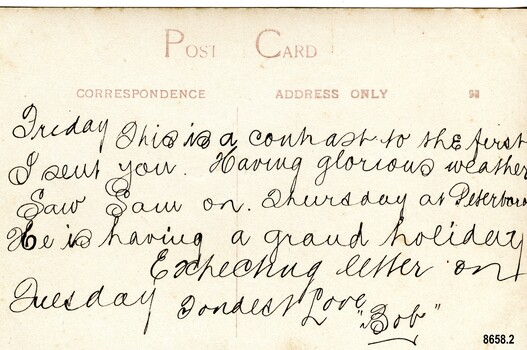 Postcard with handwritten message on the back