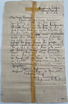 Upright handwritten script letter in black ink. Blue lined, yellowing paper has been repaired with an adhesive join down the centre.