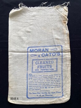 Back view, flour bag from Moran & Cato’s, Fitzroy, Melbourne, containing a written advertisement for 'Cleaned Fruits'.