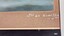 Close up of title of the painting in white Gothic font - "The S. S. Rowitta" and "121 tns"