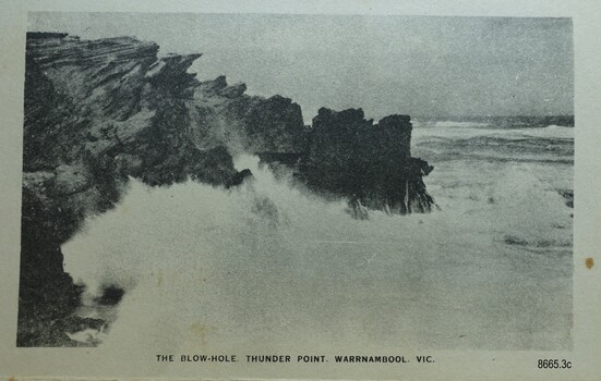 Rugged rocky cliffs with waves smashing against them