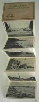 Folder opened and one side of strip of photographs is displayed